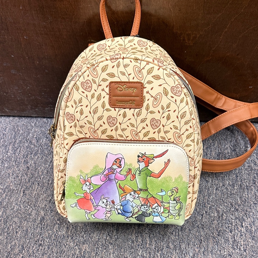 Loungefly Cream Backpack with Robin Hood Design